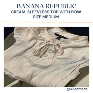 Price ⬇️ Banana Republic Cream Sleeveless top with ruffle trim and bow, size Med